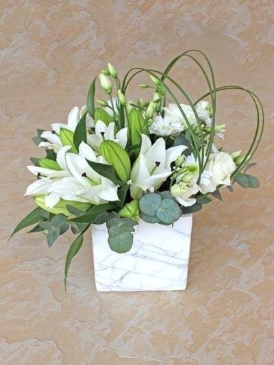 Luxury Marble Elegance: White Rose and Lily Arrangement in a Ceramic Vase