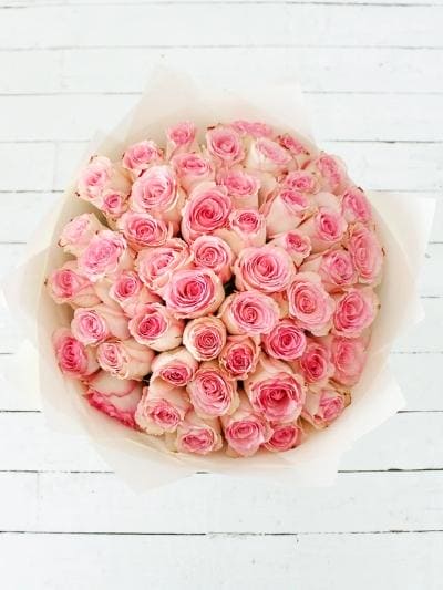 Feminine Elegance: 50 Pink Roses Hand-tied Bouquet