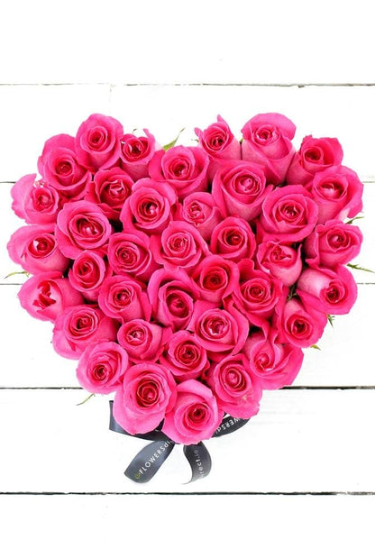 Opulent Fuchsia Pink Roses in a Petite Heart-shaped Gift Set - Harrys Flowers London